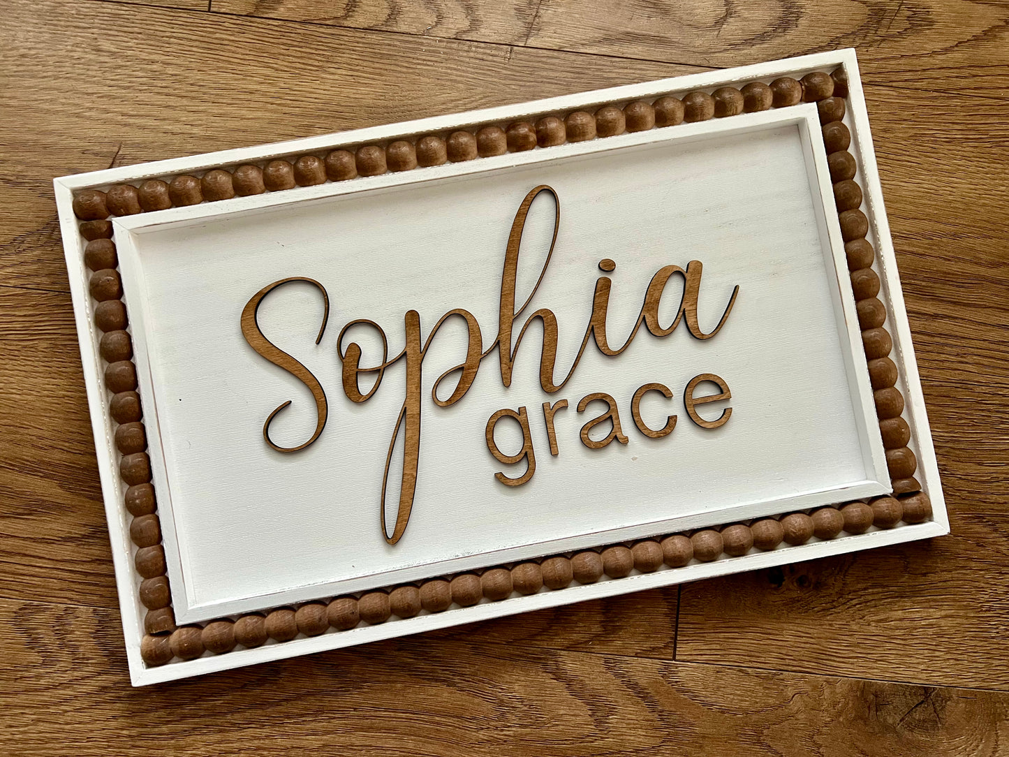 Personalized White Nursery Name Sign With Beaded Frame